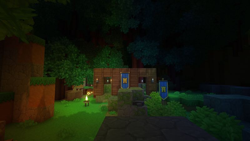 A Home at night, its banners lit by lanterns and coloured flames